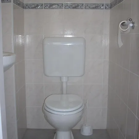 Abádi Karmazsin Ház Casa de Férias *